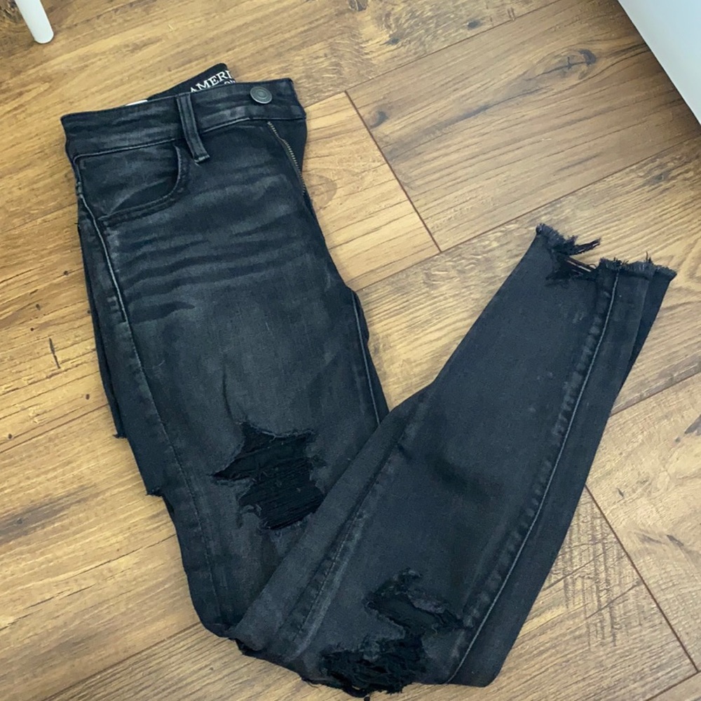 black ripped jeans